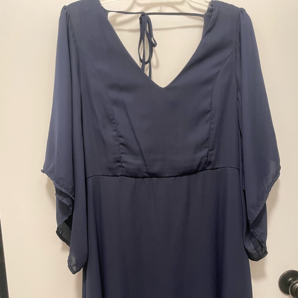 Navy knee length size L with bell sleeves